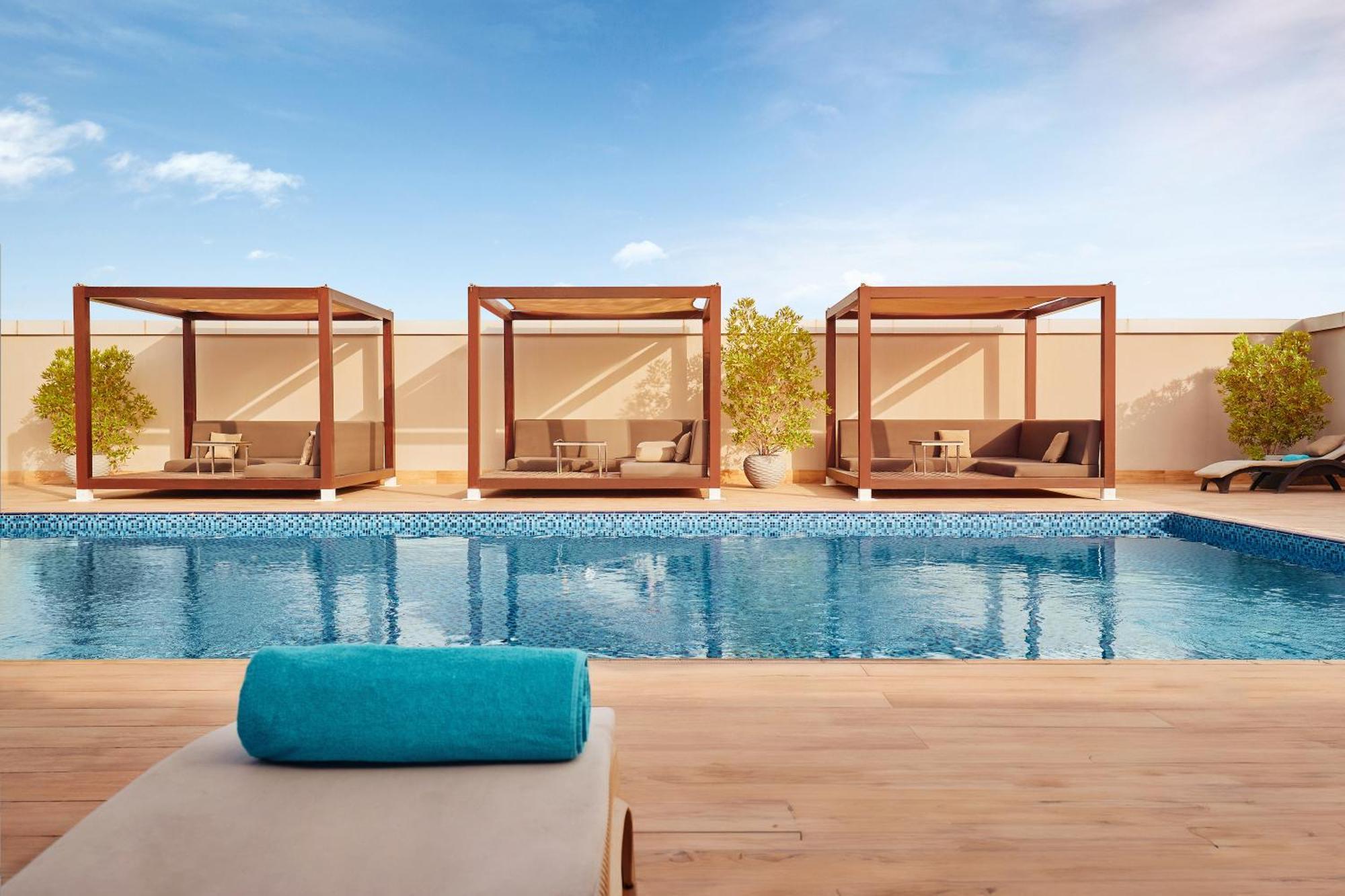 Flora Inn Hotel Dubai Airport Exterior foto Rooftop pool