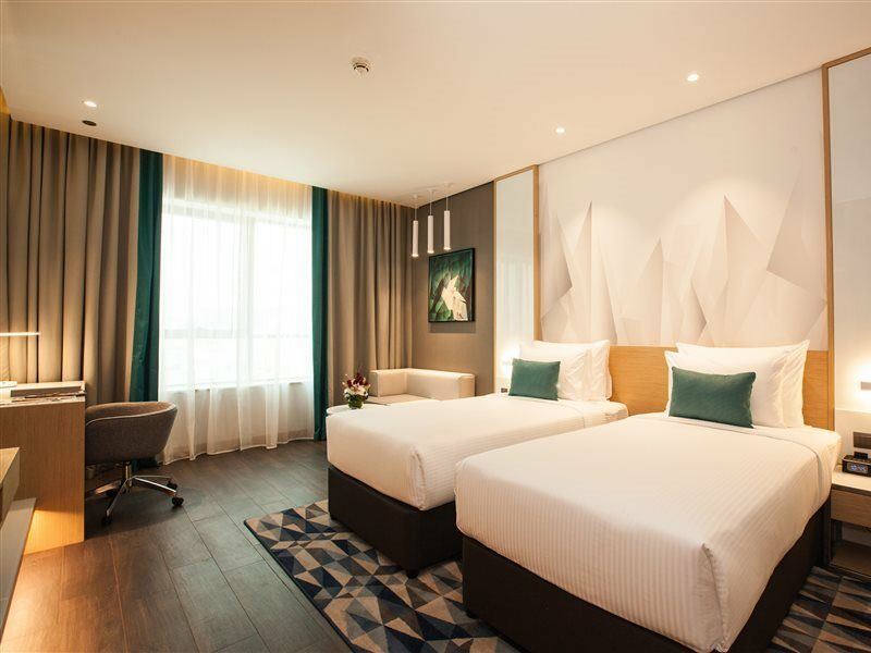 Flora Inn Hotel Dubai Airport Exterior foto A room at the hotel
